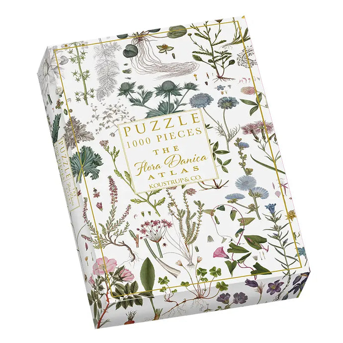 a photo of a jigsaw puzzle box with floral images and text on box. puzzle 1000 pieces the flora danica atlas koustrup & co. 