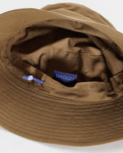 Load image into Gallery viewer, the interior of a baggu bucket hat in tameaind colour
