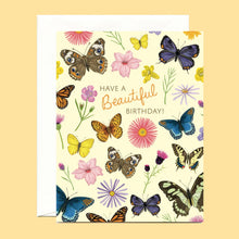 Load image into Gallery viewer, a colourful greeting card covered in different butterflies and small flowers with text have a beautiful birthday
