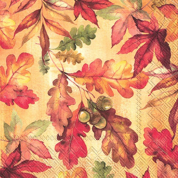a package of paper napkins with brown yellow and orange leaves with acorn accents