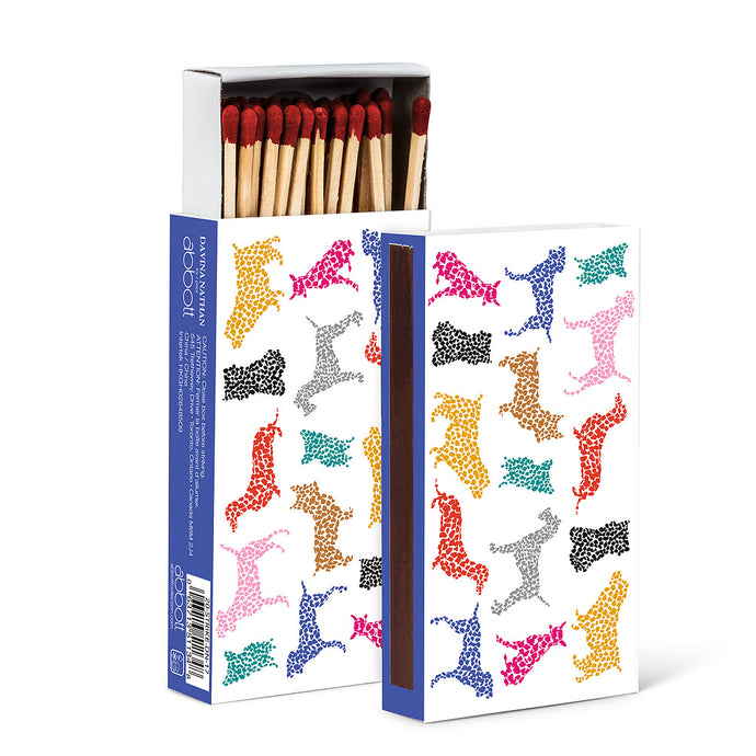 a box of wooden matches with speckled colourful dogs motif 