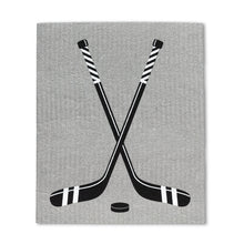 Load image into Gallery viewer, a kitchen dishcloth set, with two black and white hockey sticks featured on the motif
