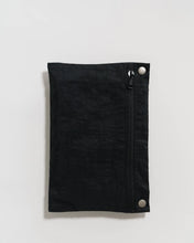 Load image into Gallery viewer, a black pouch to hold a folded cloud travel baggu bag 
