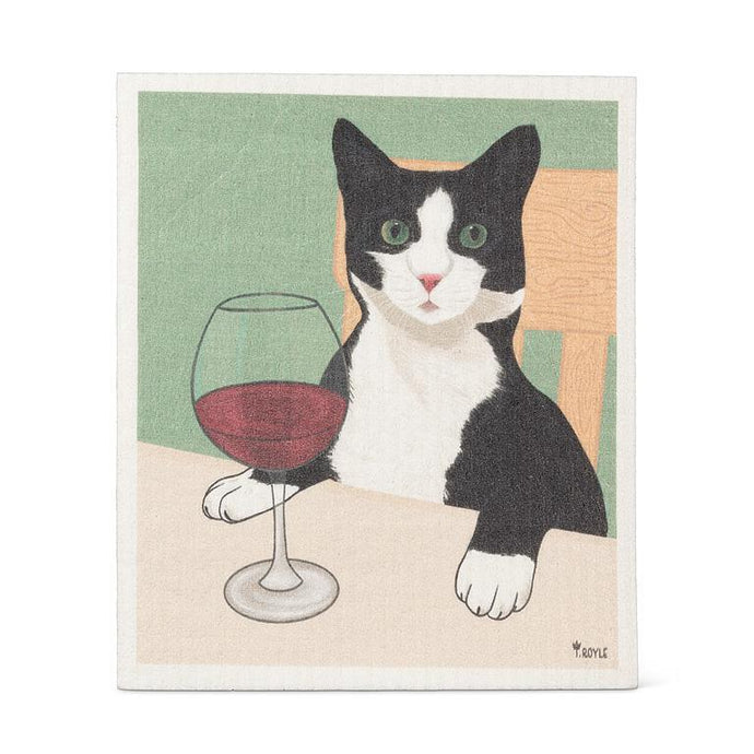 Cat with a glass of red wine on a green background