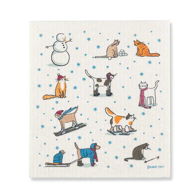 Festive towel with winter-themed illustrations of animals in various winter activities on a white background.