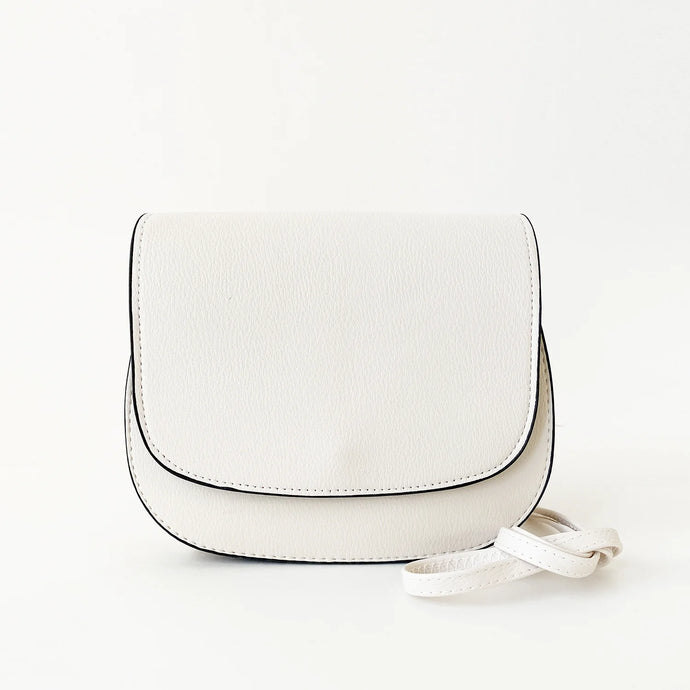 a small crossbody bag in beige off white with strap