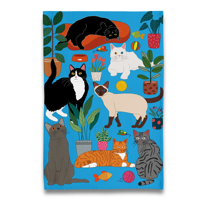 a tea towel with five different cats on a blue background 