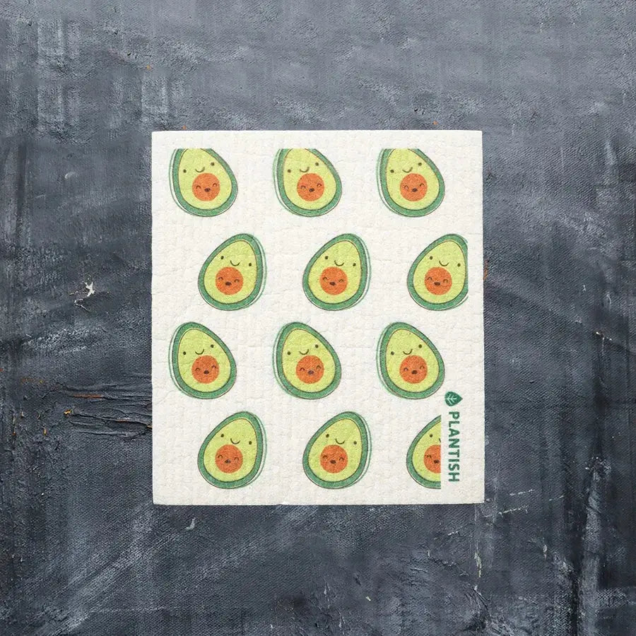 a photo of a kitchen dishcloth covered in avocado fruit motif 