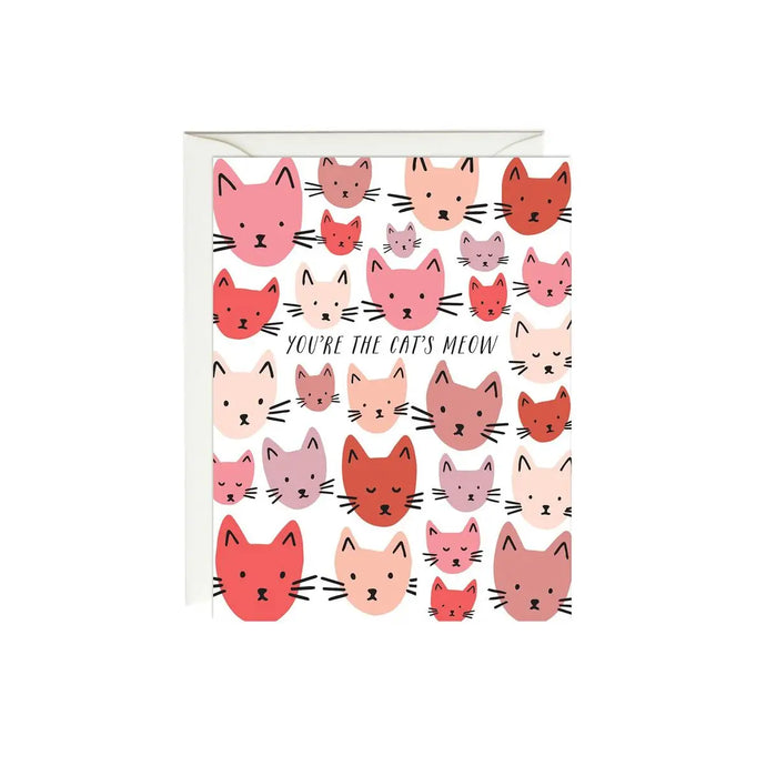 a white coloured greeting card with several pink and red coloured cat faces drawn on it, with text, you're the cat's meow 