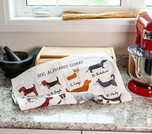 Load image into Gallery viewer, a dog alphabet tea towel aying on a kitchen counter 
