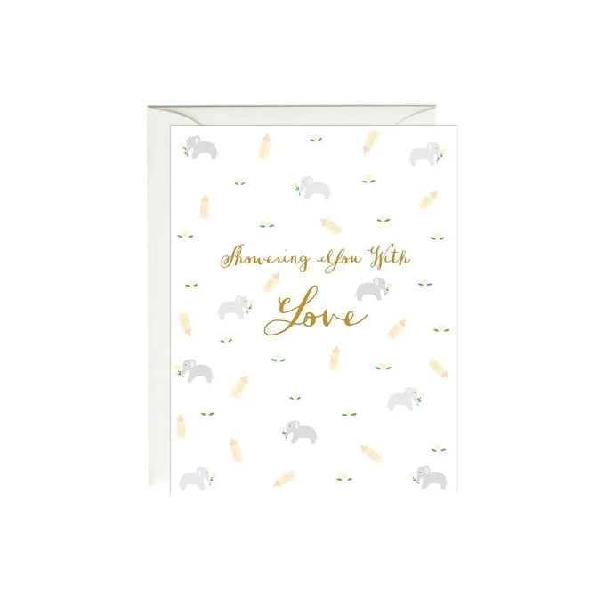a white coloured greeting card with illustrations of tiny elephants . text showering you with love 