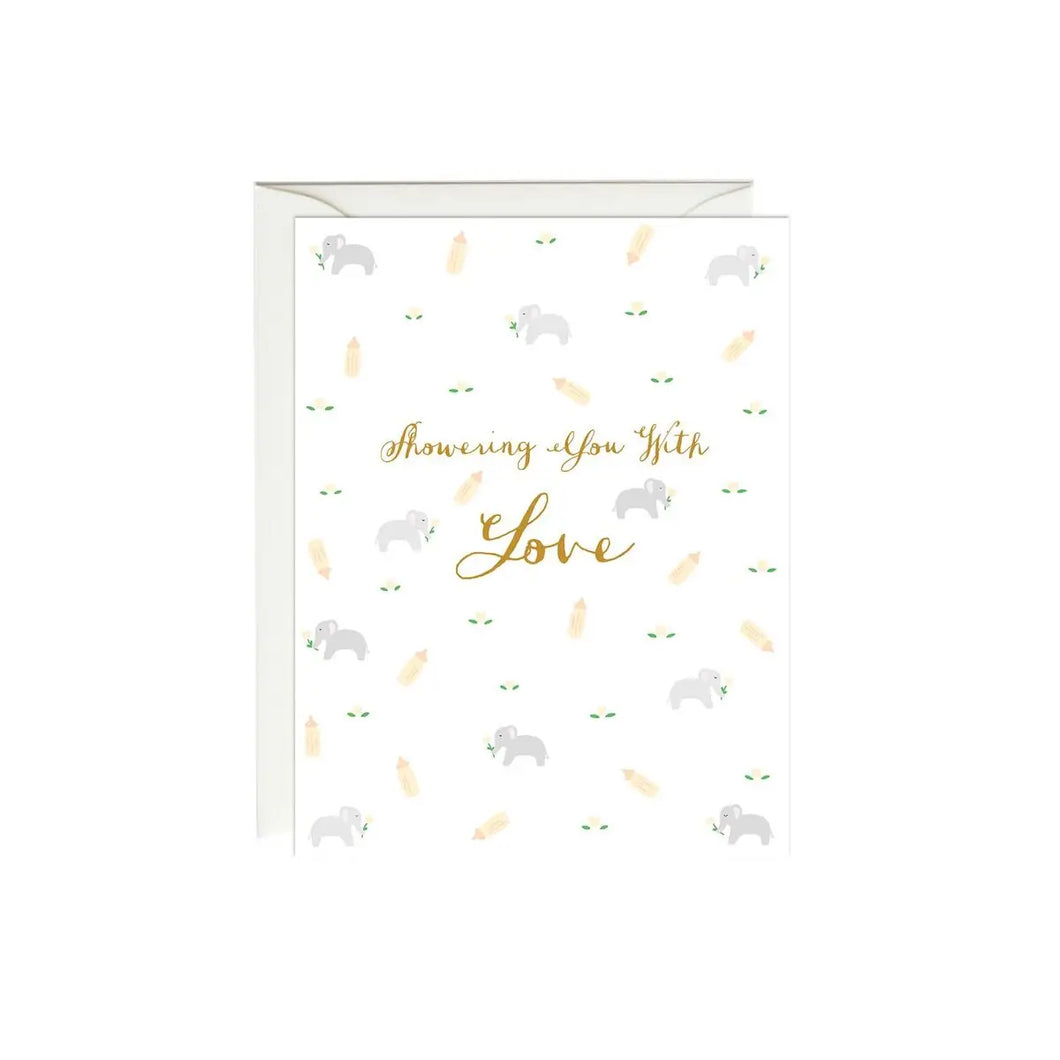 a white coloured greeting card with illustrations of tiny elephants . text showering you with love 