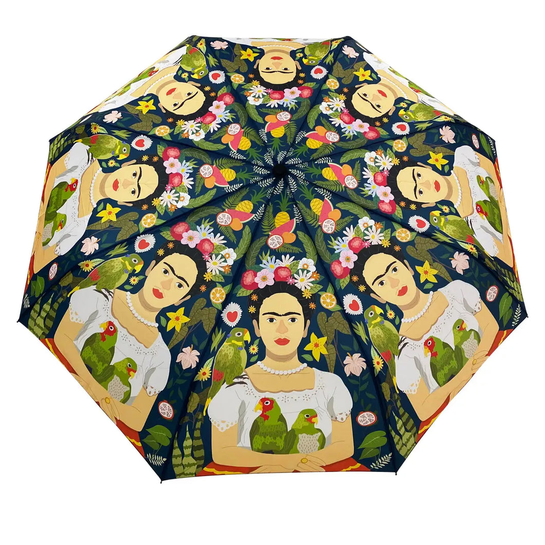 a colourful rain umbrella with images of Mexican artist Frida Kahlos parrots with the artist. 