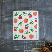 画像をギャラリービューアに読み込む, a kitchen dishcloth featuring fruit of peaches 
