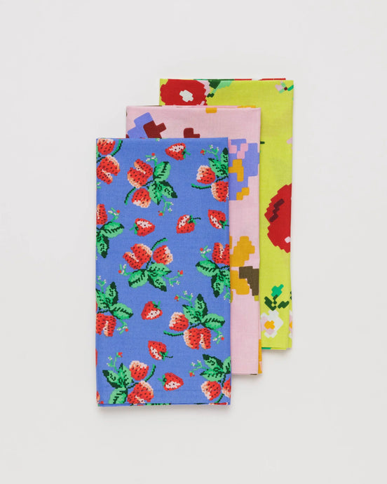 a set of 3 baggu brand reusable cloths with various floral patterns 
