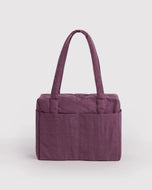 Purple handbag on a light gray background