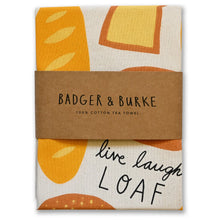 Load image into Gallery viewer, Cotton tea towel with orange and beige pattern and 'Badger &amp; Burke' branding.
