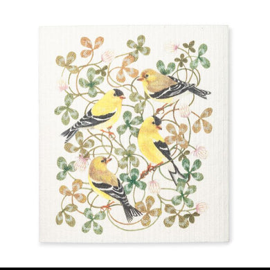 a Swedish dishcloth fetruring yellow finch birds on clover 