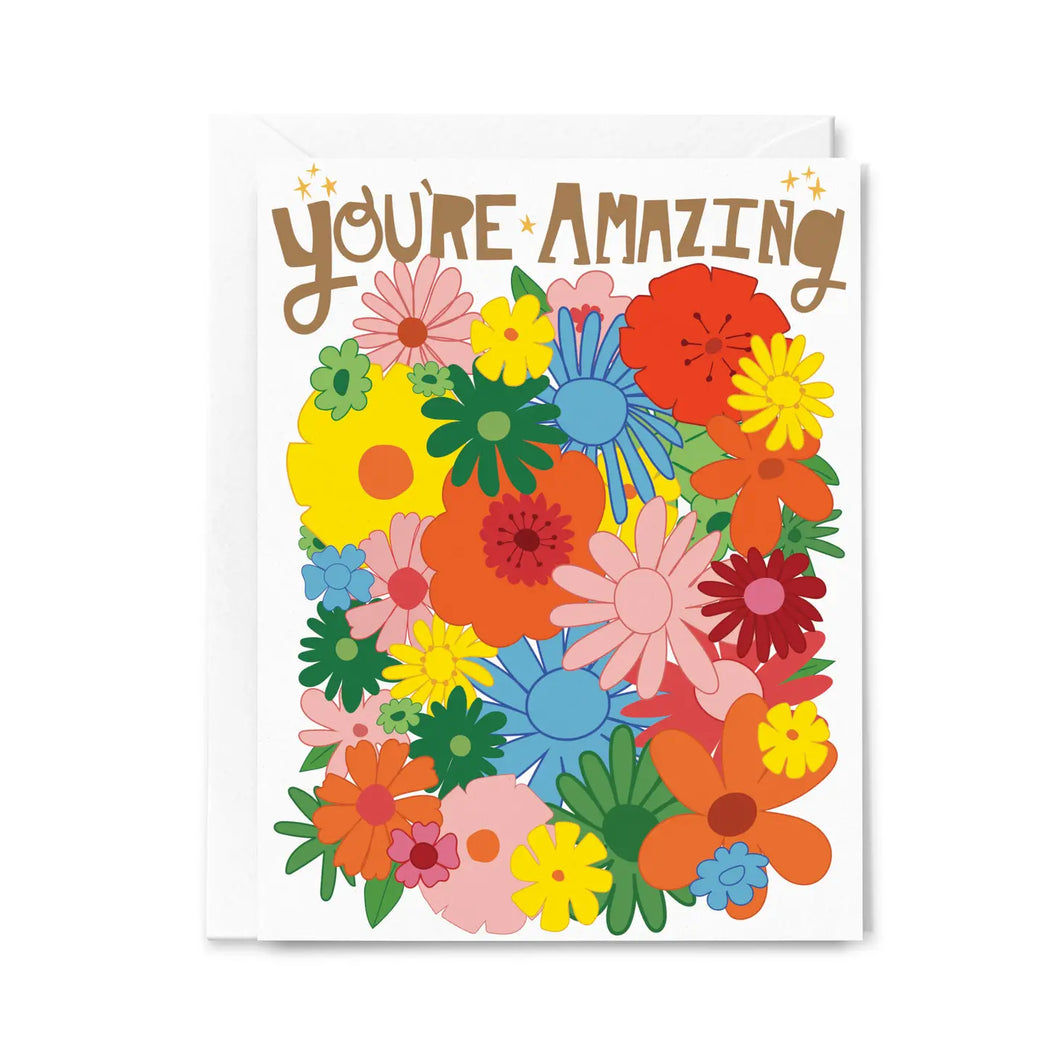 a greeting card with colourful illustration of 1970's style flowers with text. you're amazing 