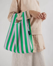 Load image into Gallery viewer, a baggu baby size  reusable bag in a awning stripe of green and ink 
