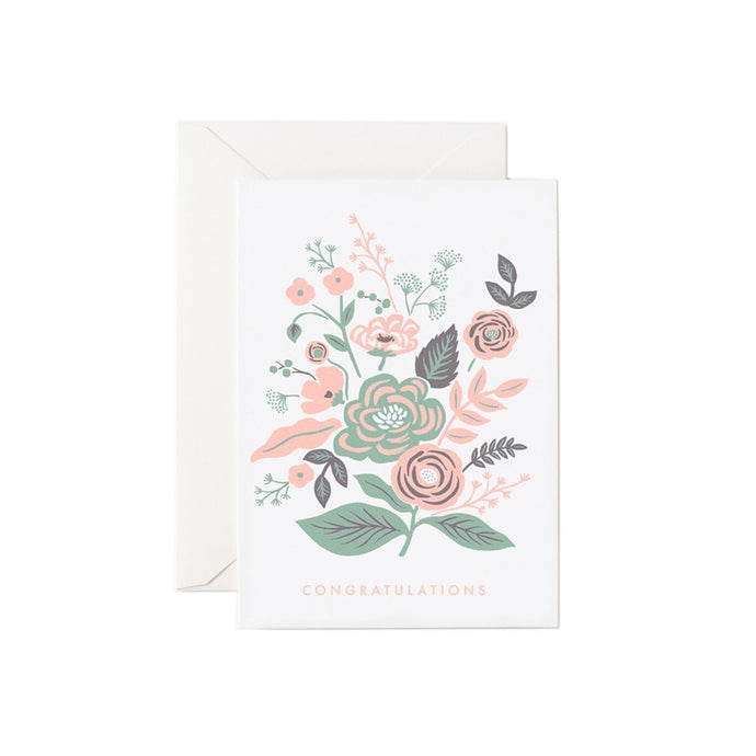 a white greeitng card with soft pink and green colour drawings of flowers in a cluster with a white envelope says congratulations on front 