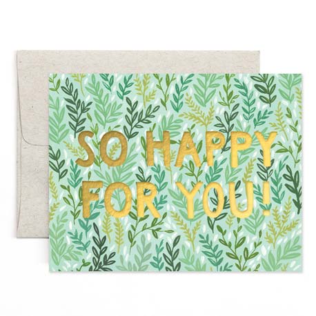 an colourful illustration of small assorted shades of green leaves with gold script on front says so happy for you with a light grey coloured envelope 