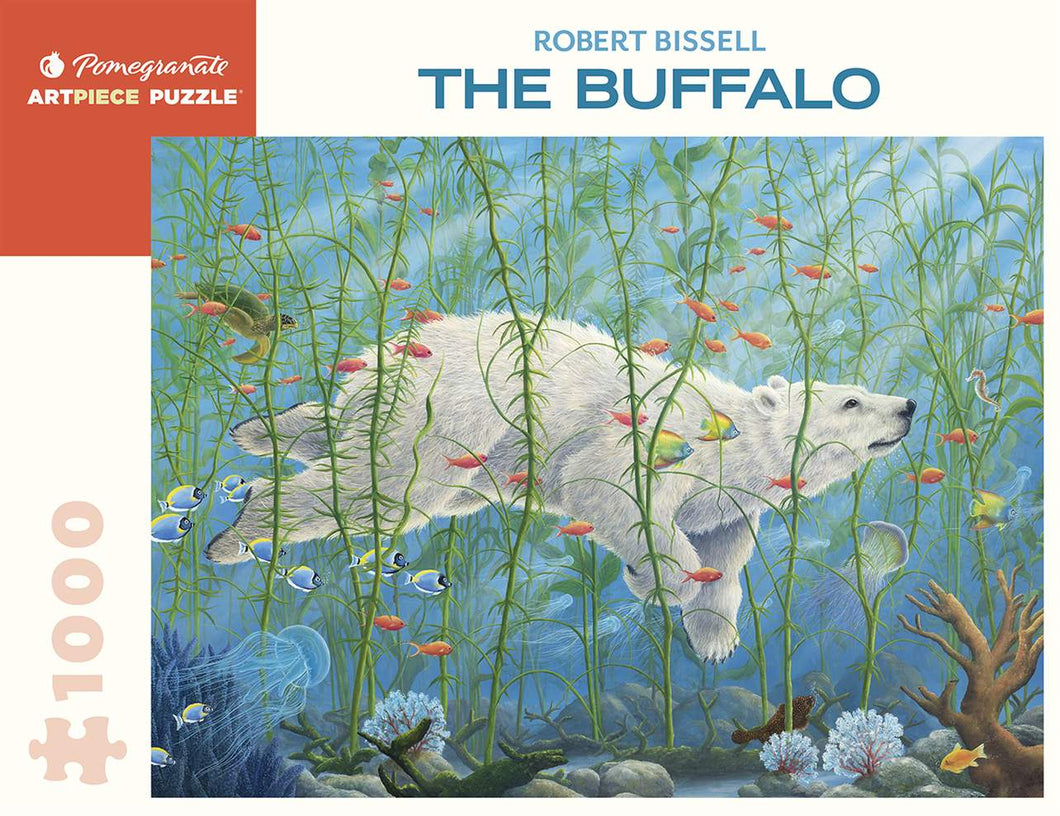 colour painting of a white polar bear swimming under the sea with tropical fish depicted on a jigsaw puzzle
