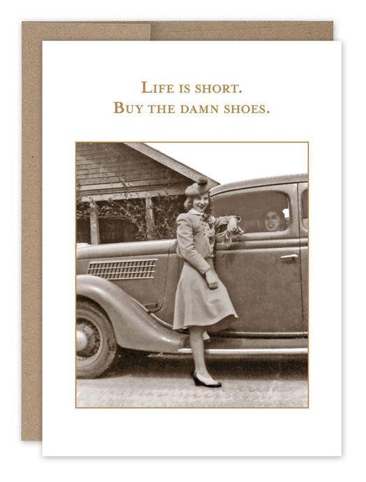 a sepia toned photo of a woman dressed up in high heels, ha, and fancy coat leaning againest an old car with another woman smiling at the drivers seat 
