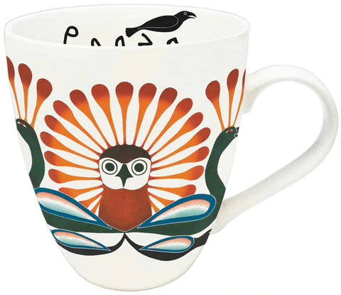a mug with Inuit art of an owl on it. 