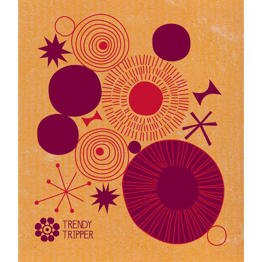 a swedish dishcloth in orange colour with abstract spirals in dark orange and red