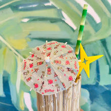Load image into Gallery viewer, a photo of a tiny cocktail umbrella on a cocktail with a bamboo straw
