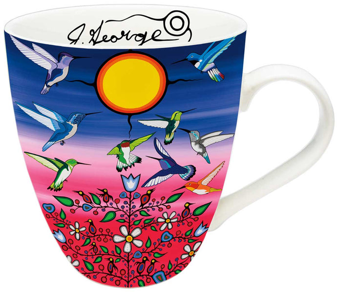 a kitchen mug with Indigenous art of hummingbirds and flowers 
