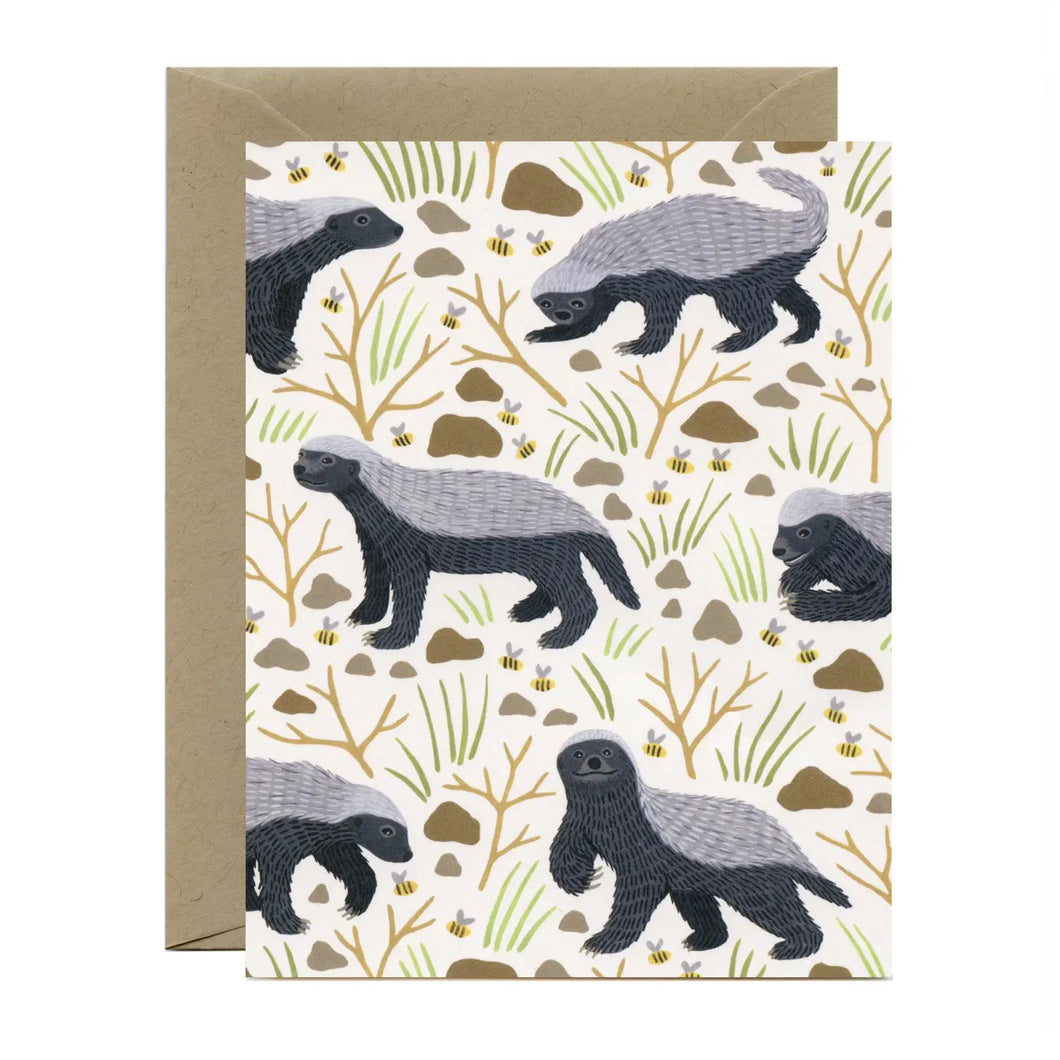 a greeting card with illustrations of badgers and small plants and stones. no text 