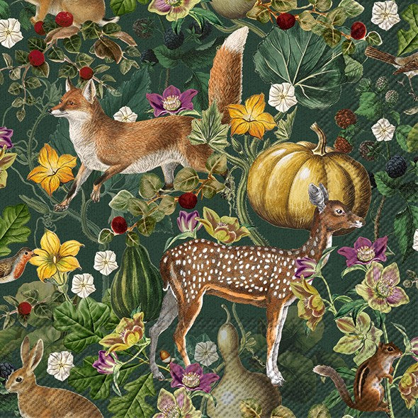 a paper napkin with mi=otif of deer, foxes, bunnies and pumpkins for the autumn 