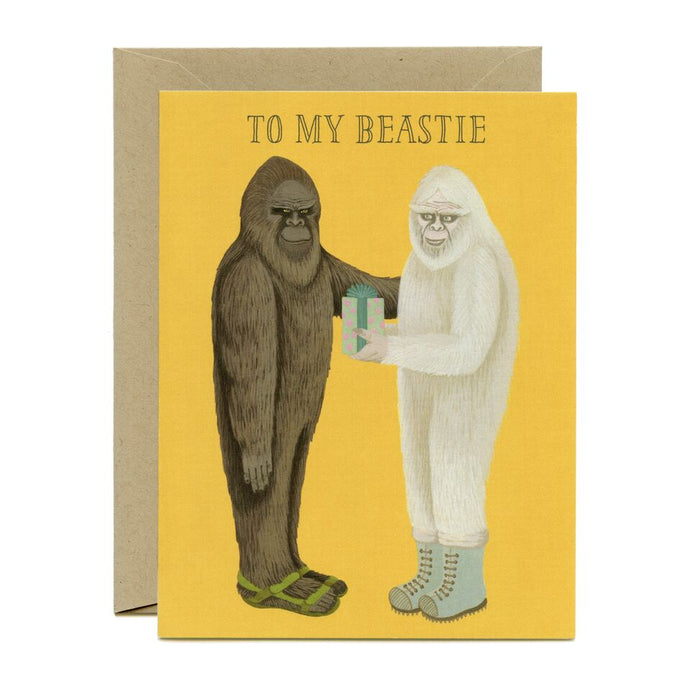 a colour illustration of a greeting card with two sassqatches wearing boots and exchanging a gift text says to my bestie