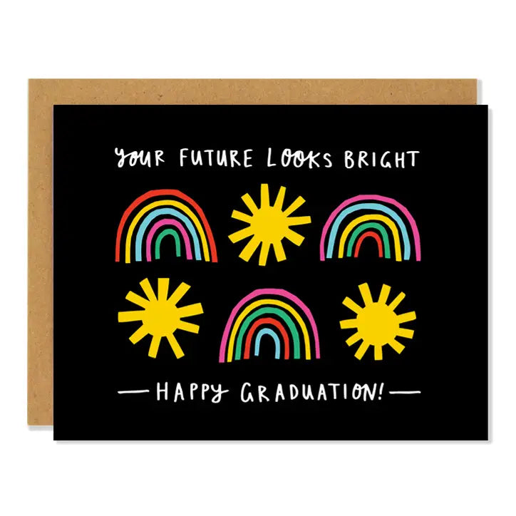 a black coloured greeting car with rainbows and suns. text. your future looks bright. happy graduation