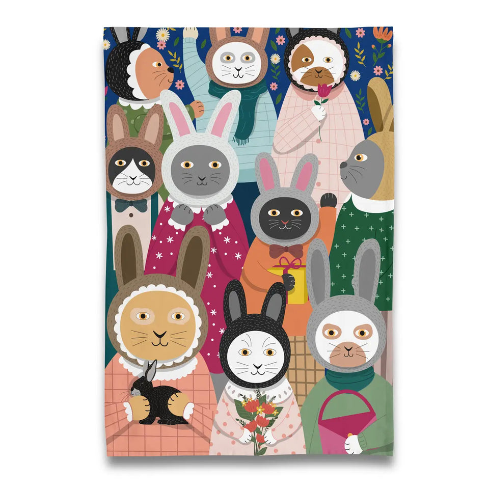 a kitchen tea towel covered in rabbits 