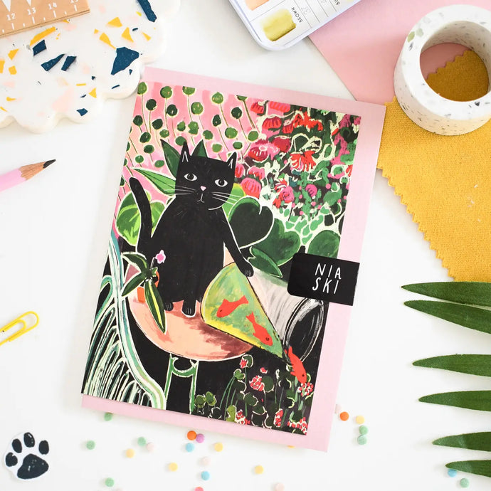 a greeting cad with illustration of a black cat that has knocked over a vase with goldfish in the style of artist henri matisse goldfish painting 