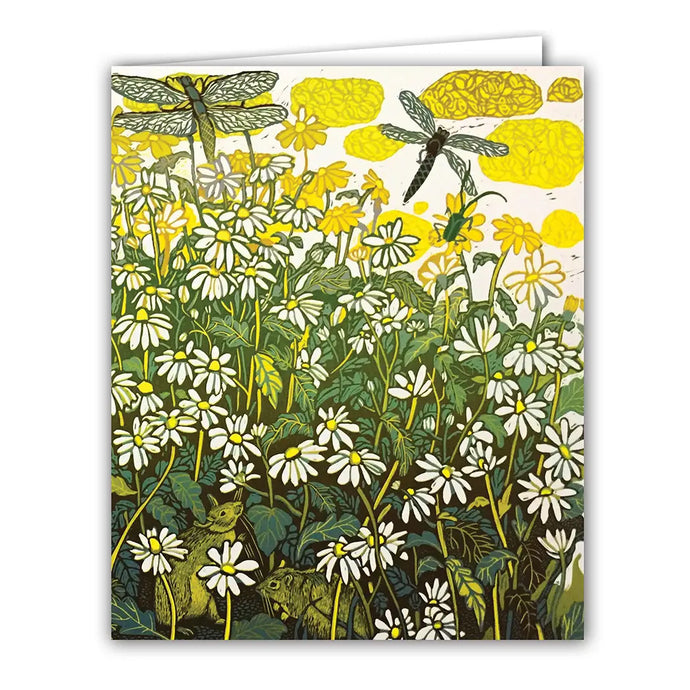 a greeting card with an illustration of a meadow full of chamomile flowers and 2 tiny mice hiding with 2 dragonflies overhead. primarily in yellow and green colours 