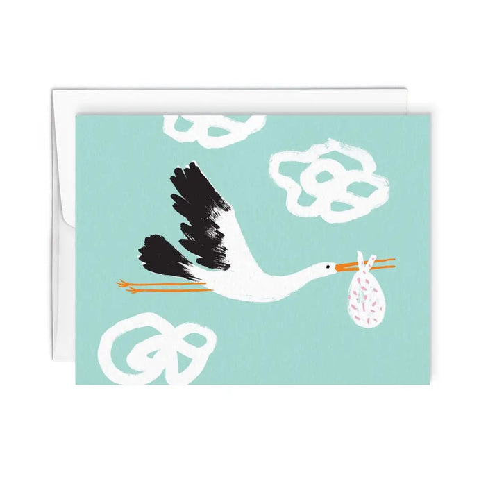 colour illustation of a black and white stork flying throught the sky with a baby bundle in its beak. on turquoise back drop modern