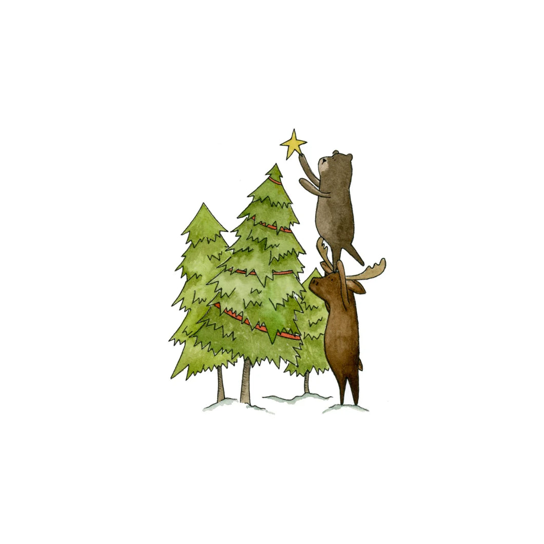 colour illustration of a moose giving a bear a boost to place a star on top of a cooked christmas tree whinsical