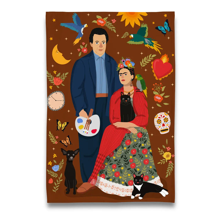 a tea towel with an illustration of artists frida khalo and diego rivera and thir cats 