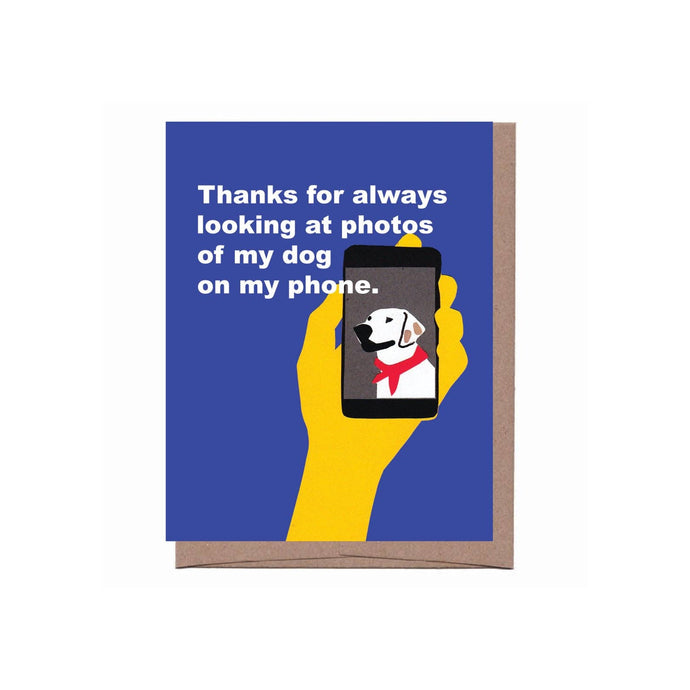 an illustration of a dog on a cell pphone held in someones hand on a blue backdrop