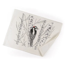 Load image into Gallery viewer, a white tea towel with a black drawing of a woodpecker bird in a birch tree 
