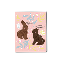 Load image into Gallery viewer, illustration of 2 chocolate rabbits, one with ears bitten off 
