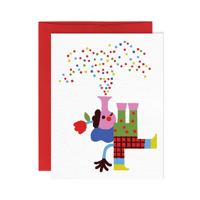 a greeting card with an illustraion of an elephant looking up as if to toot a horn with colourful confetti popping out the top in a celebratory manor