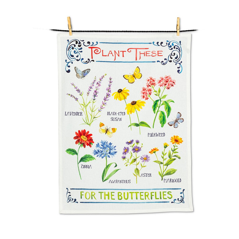 a white tea towel with flowers an butterflies. text plant these for the butterflies 