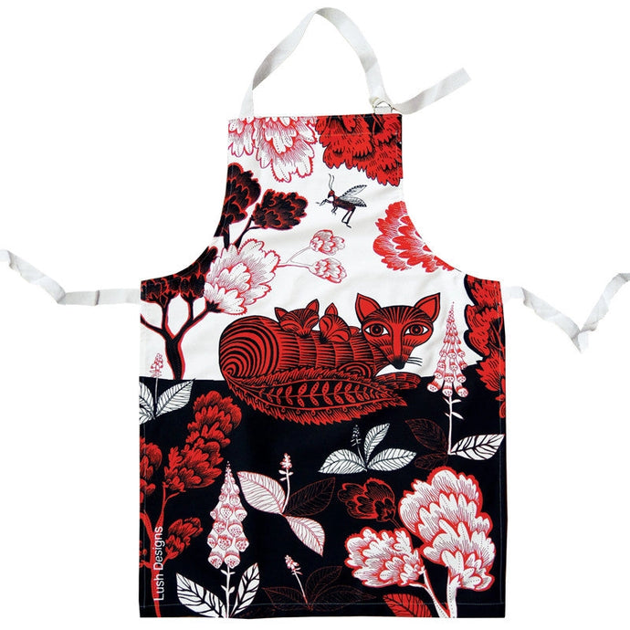 an apron with an artist depiction of a fox and her cubs 