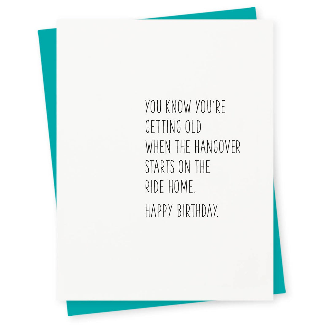 a white greeting card with no picture, words say you know you're getting old when the hangover starts on the ride home. happy birthday , in black ink 