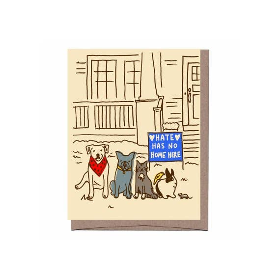 a greeting card with an illustration of two dogs, a cat and a bunny and a small mouse sitting beside each other in front of a house, text on a little sign infront says hate has no home here with tow little hearts on the sign.